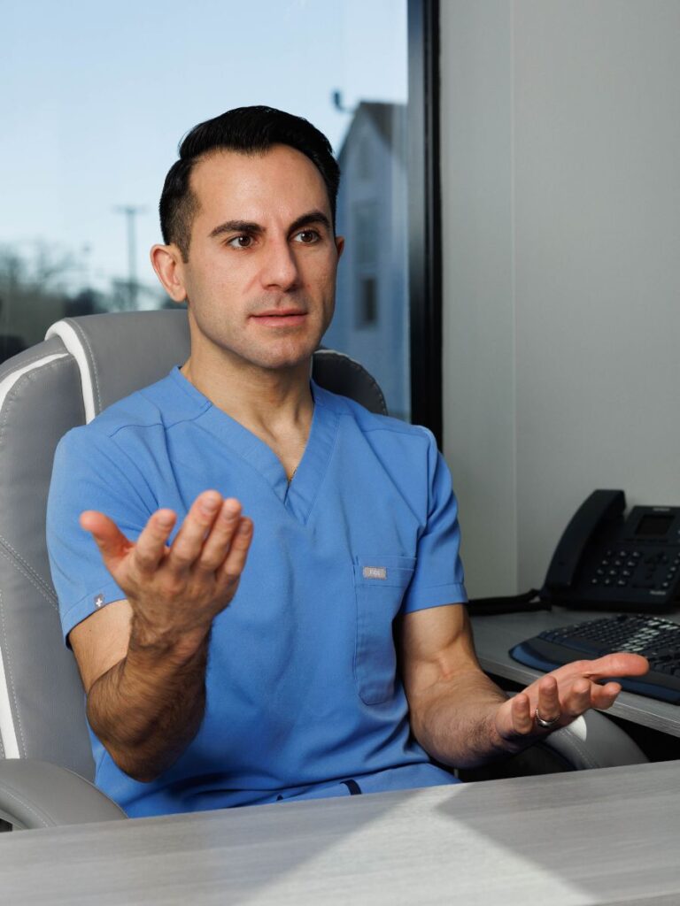 Dr. Nouri in a patient consultation